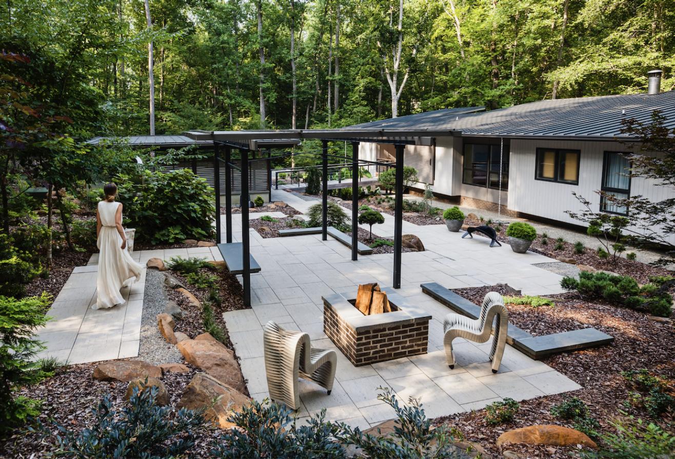 Modern paver patio with pergola and fire pit